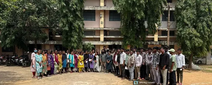 Participants assembled outside a college building