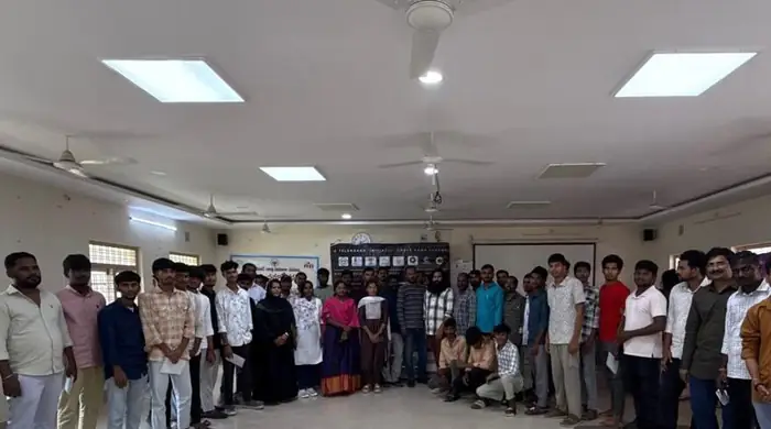 Participants and resource persons gathered in a bright programme hall